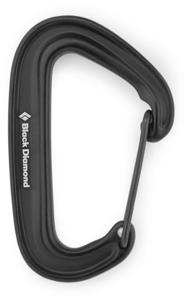 Close-up of Black Diamond MiniWire lightweight carabiner against a rocky backdrop.