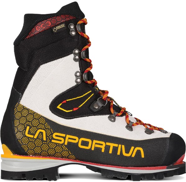 Side view of La Sportiva Nepal Cube GTX Women's Mountaineering Boots on rocky terrain.