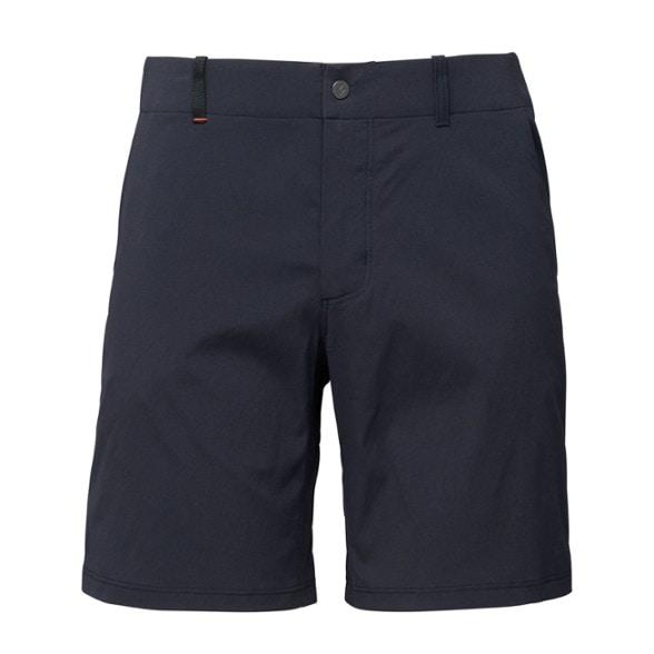 Adventure Ready men's stretch nylon shorts in a rugged outdoor setting with pockets filled with essentials.