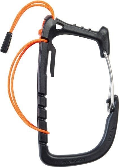 Petzl Caritool Evo ice screw holder attached to a climbing harness, showcasing easy gear access.