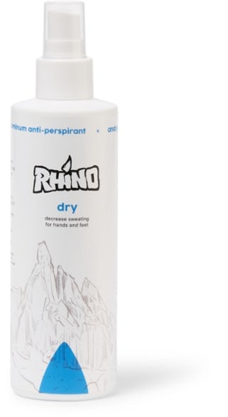 Close-up of GripGuard bottle near climbing gloves, showing sweat spray for glove use