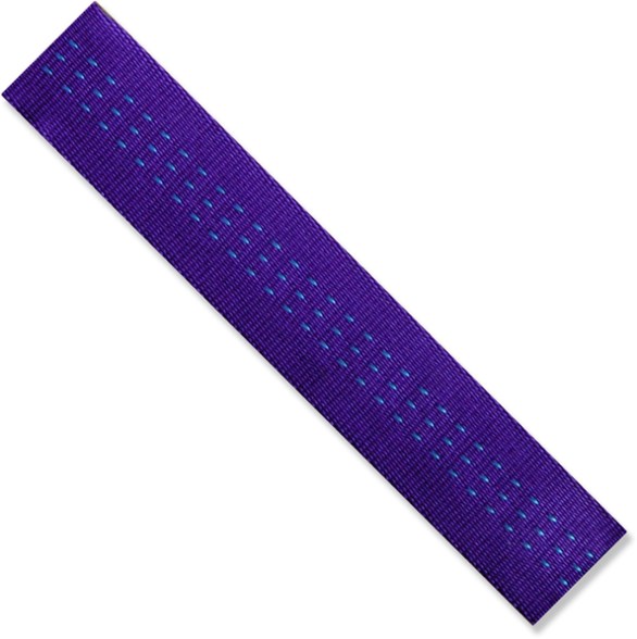 Climb-Spec 1 inch tubular webbing displayed on a rock climbing setup.