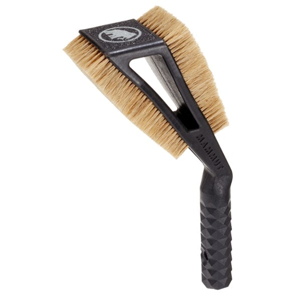 Mammut Sloper brush showcasing the ergonomic grip and soft bristles for rock climbing.