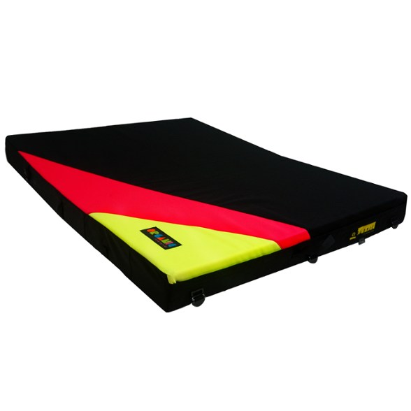 Organic Climbing Ultimate Bouldering Crash Pad on rocky terrain showing durability and design.