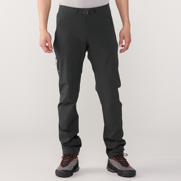 Front view of men's climbing pants with pockets showing durable soft shell fabric and adjustable waistband
