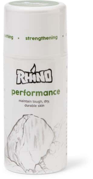 GripShield Climbing Cream tube standing upright on rocky surface
