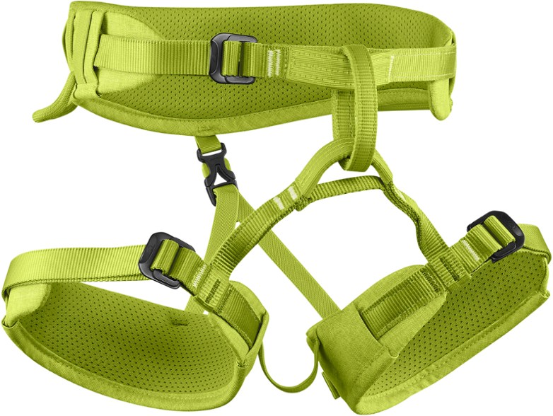 Edelrid Finn III harness shown on a child climber at a rock wall, demonstrating fit and comfort.