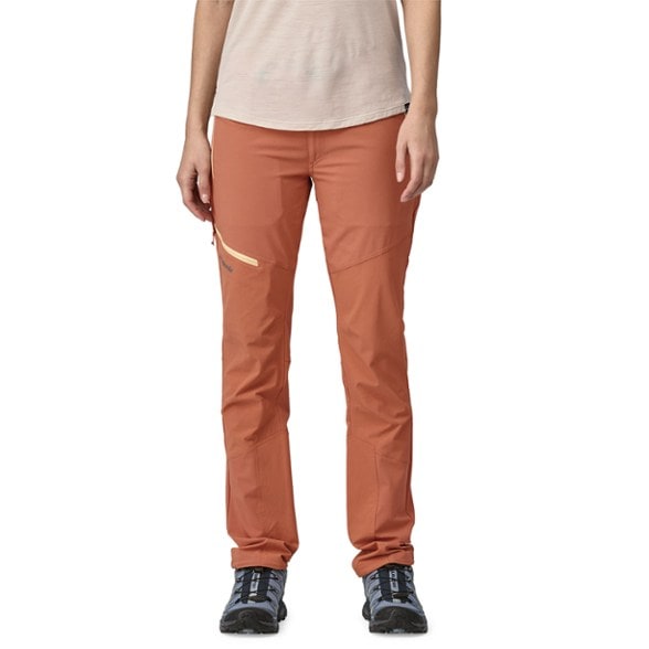 Patagonia Women's Alpine Adventure Pants showcased on a rocky alpine trail.