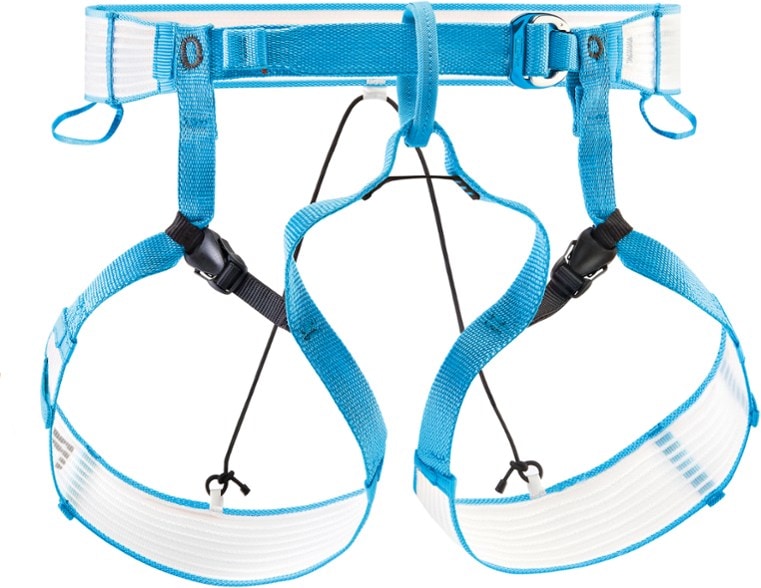 Petzl Altitude harness in use during a mountain climb, showcasing its lightweight design and gear loops.