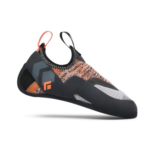 Side profile of Black Diamond Velocity kids climbing shoes on indoor wall