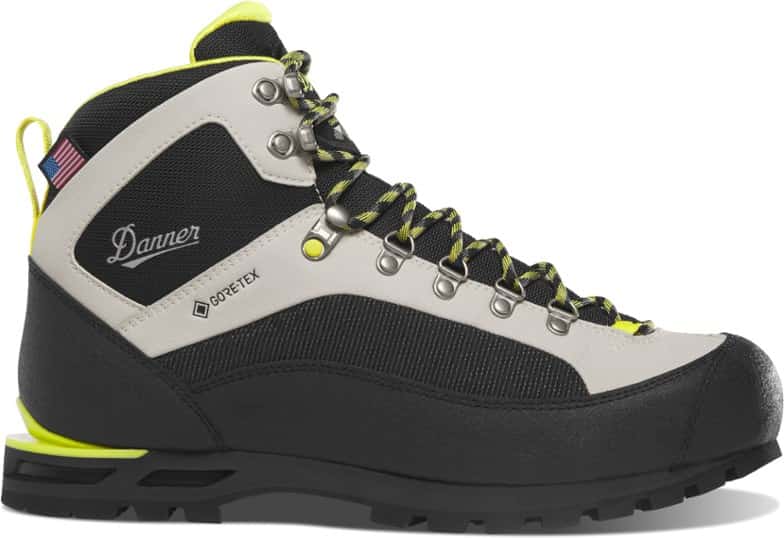 Side profile of EVO mountaineering boots showcasing crampon-compatible heel and durable mudguards