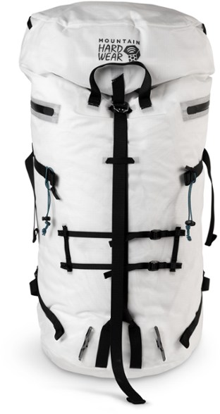 Alpine Adventure Roll-Top 45L Backpack in action on a mountain trail, highlighting its waterproof features.