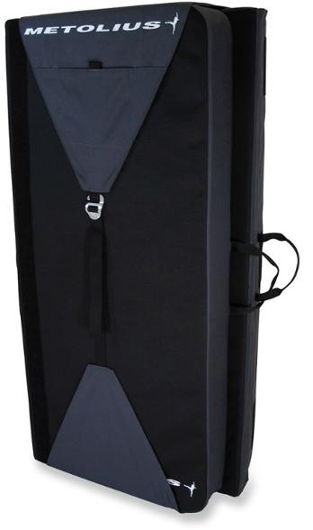 Metolius Recon crash pad open on rocky terrain, showcasing its size for bouldering.