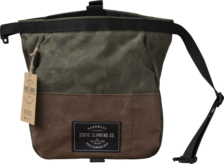 Rugged canvas chalk bucket showcasing dual hook-and-loop closure for secure storage.