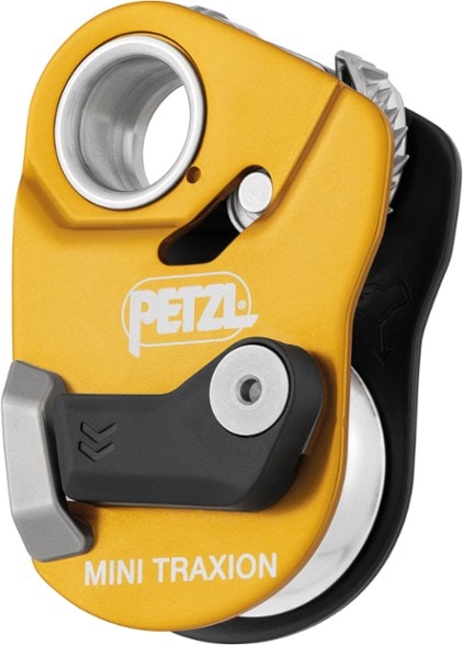Petzl Mini Traxion pulley showing large aluminum sheave and side plate design.