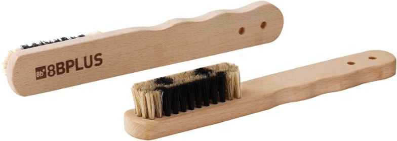 Ergonomic boar hair climbing brush with natural bristles and beechwood handle, ideal for cleaning holds.