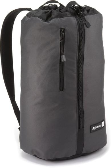 Metolius Adventure Rope Bag displayed at a crag with climbing gear inside.