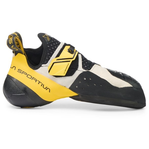 La Sportiva Solution climbing shoes showcasing the aggressive downturn and sleek design from the side.