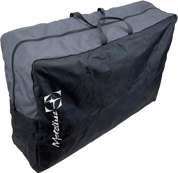 Bouldering crash pad transport bag showing suitcase-style handles from the front angle.