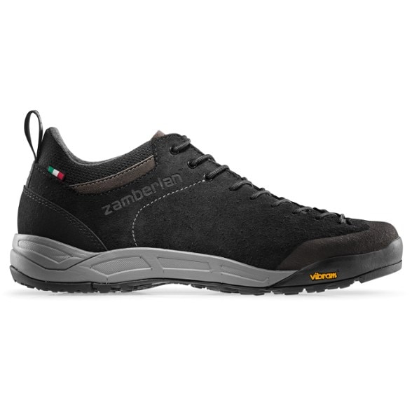 Zamberlan Nose RR Approach Shoes displayed on rocky terrain, showcasing their grip and design.
