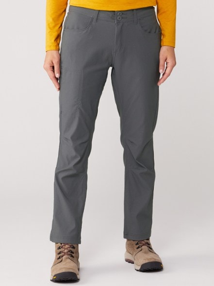 Eco-friendly women's hiking pants showcasing their lightweight material and articulated knees.