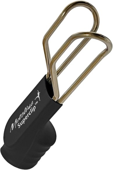Metolius Superclip Pro attached to a climbing harness, showcasing its lightweight design.