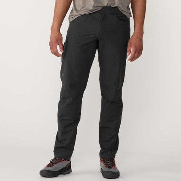 Side view of Kragg Performance Pants showcasing stretch fabric and pockets for climbing.
