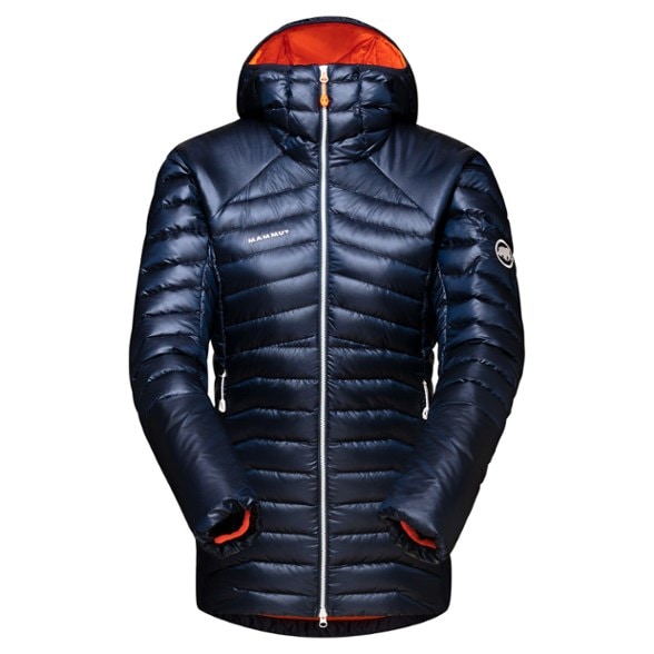 Mammut Eigerjoch Women's Packable Insulated Jacket in a snowy mountain setting, showcasing its stylish design.