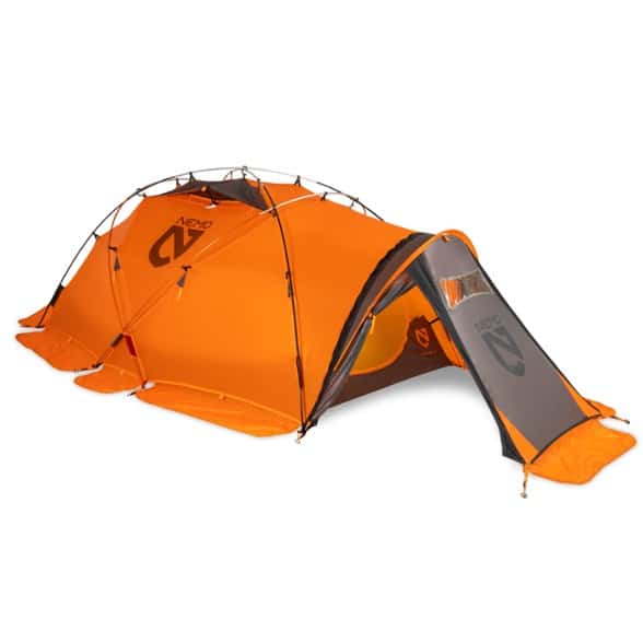 NEMO Chogori tent setup in snowy mountain terrain with gear stored in vestibule