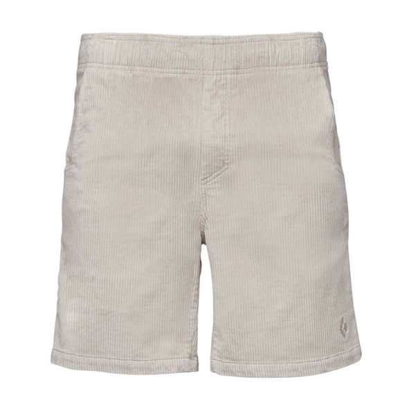Men wearing retro corduroy climbing shorts on a mountain trail, showcasing their functional pockets and drawcord waistband.