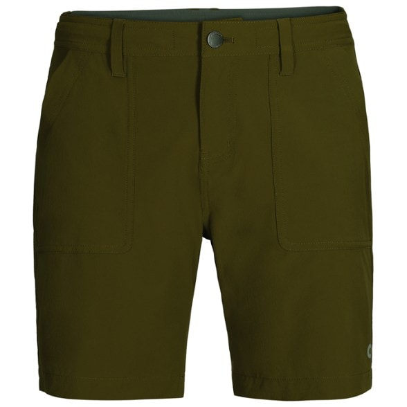 Side view of women's eco-friendly hiking shorts during a mountain hike, showcasing stretchable fabric.