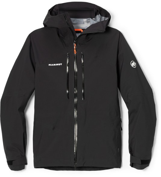 Mammut Taiss HS Men's Hooded Jacket featured in a hiking setting, showing its waterproof capabilities.