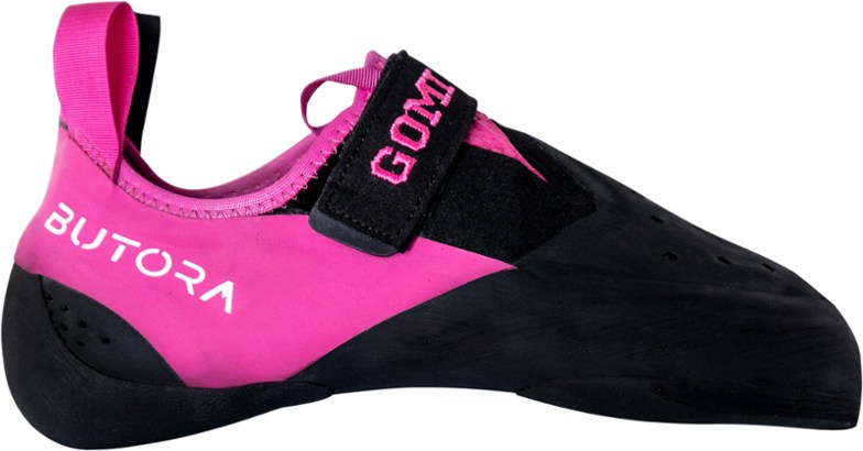 Side profile of the aggressive climbing shoes showing downturned toe and sticky rubber construction.