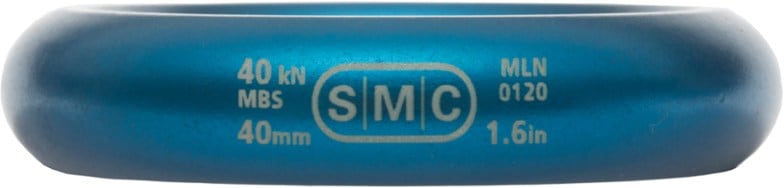 Close-up of SMC Radius Climbing Ring showcasing its orange-anodized finish and smooth edges.