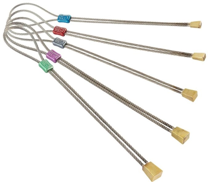 DMM IMP brass climbing nuts set showcasing all five sizes for rock climbing.