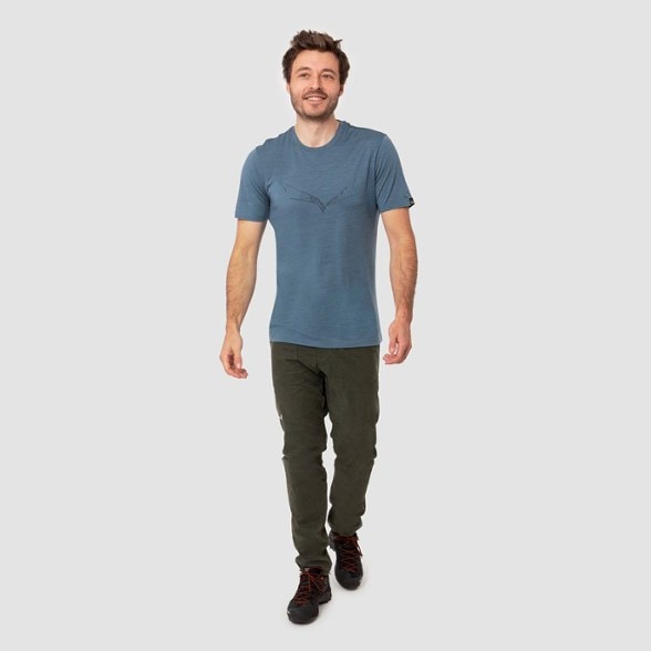 Men's climbing pants showcasing lightweight hemp fabric from the side angle.