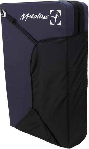 Top view of the Metolius Session II BoulderPro Crash Pad laid flat on rocky terrain, showing its durable surface and carpeted logo.