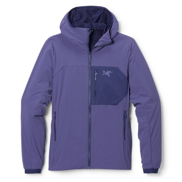 Side view of women's insulated jacket showing fitted cut and breathable fabric ideal for hiking
