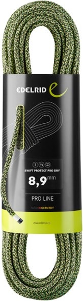 Edelrid Swift Protect Pro climbing rope coiled for easy access and use in outdoor settings.