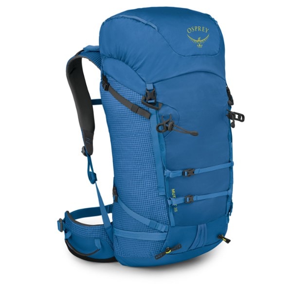Osprey Mutant 38 backpack shown on a climber navigating steep ice terrain.
