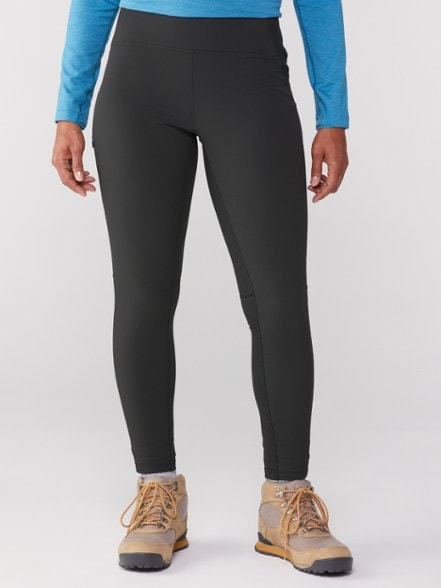 Chockstone Women's Climbing Tights in action on a hiking trail, showcasing flexibility and fit.
