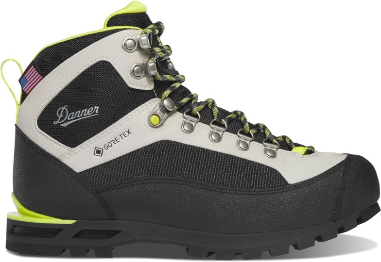 Danner Women's Crag Rat EVO mountaineering boots showcasing the GORE-TEX waterproof feature in snowy terrain.
