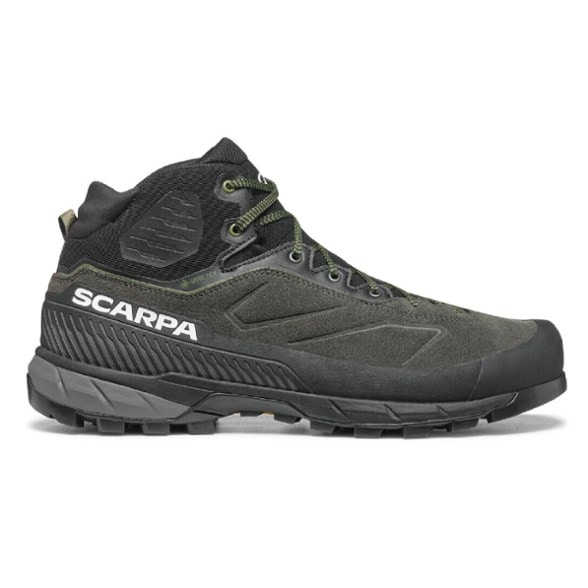 Scarpa Rapid XT Mid GTX approach shoes from the side, showcasing their waterproof design and mid-cut profile.