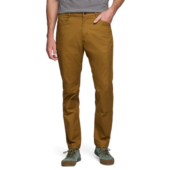Men's Summit Stretch Canvas Pants showcased in a climbing setting.