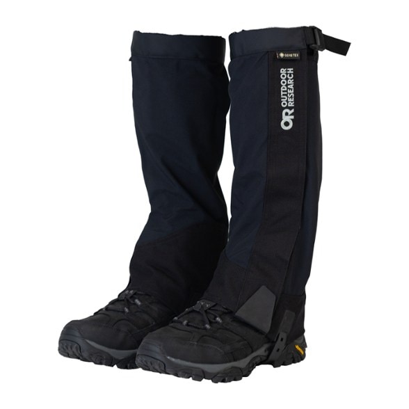 Close-up of the gaiters fastened securely over hiking boots in deep snow – showcasing waterproof gaiters in action.