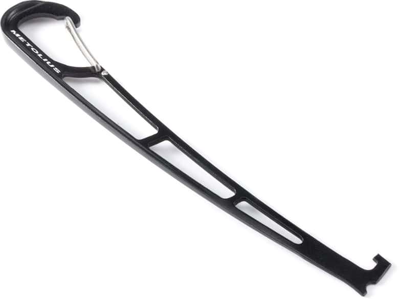Metolius Feather nut tool showing its curved design and tapered nose for easy nut extraction.