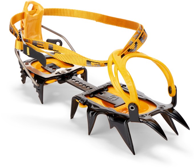 Grivel G12 EVO crampons on a snowy mountain, showcasing their stability and grip.