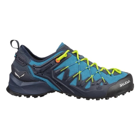 Side view of the Salewa Wildfire Edge Approach Shoes, highlighting the flexible design for climbing.